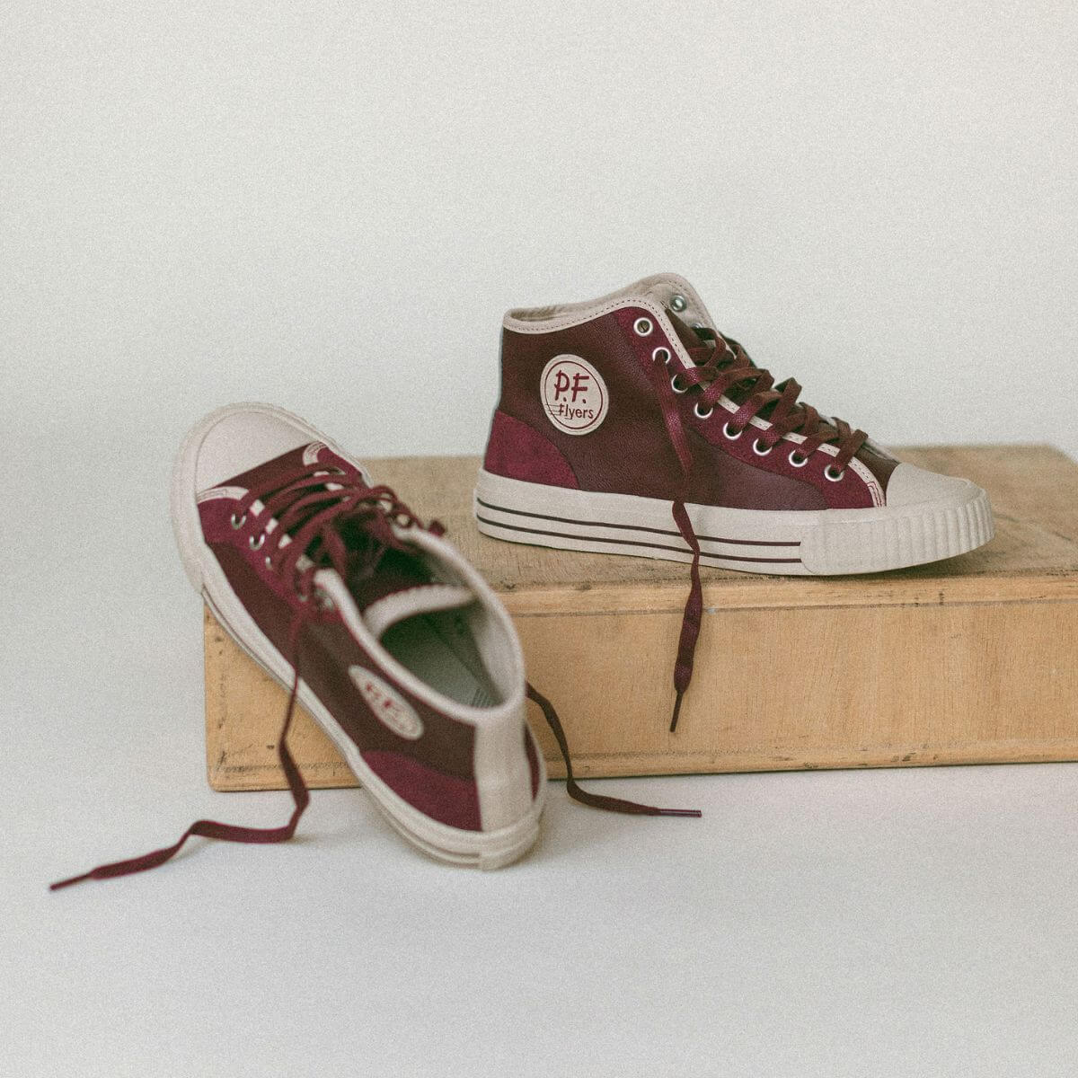 Red high-top leather sneakers