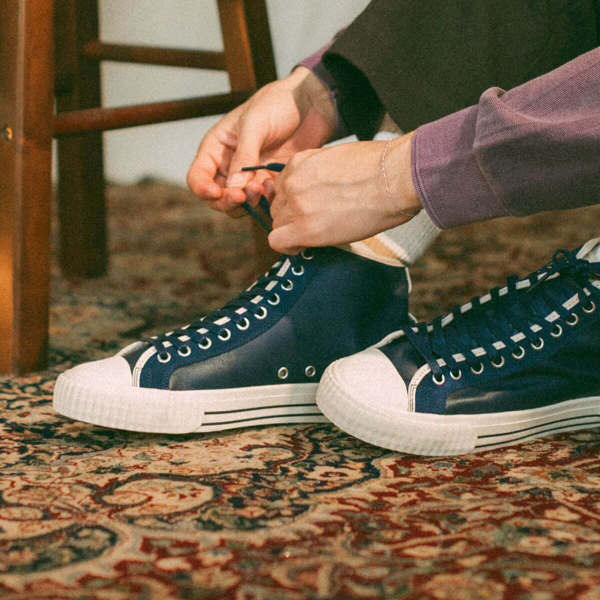 Navy high-top leather sneakers