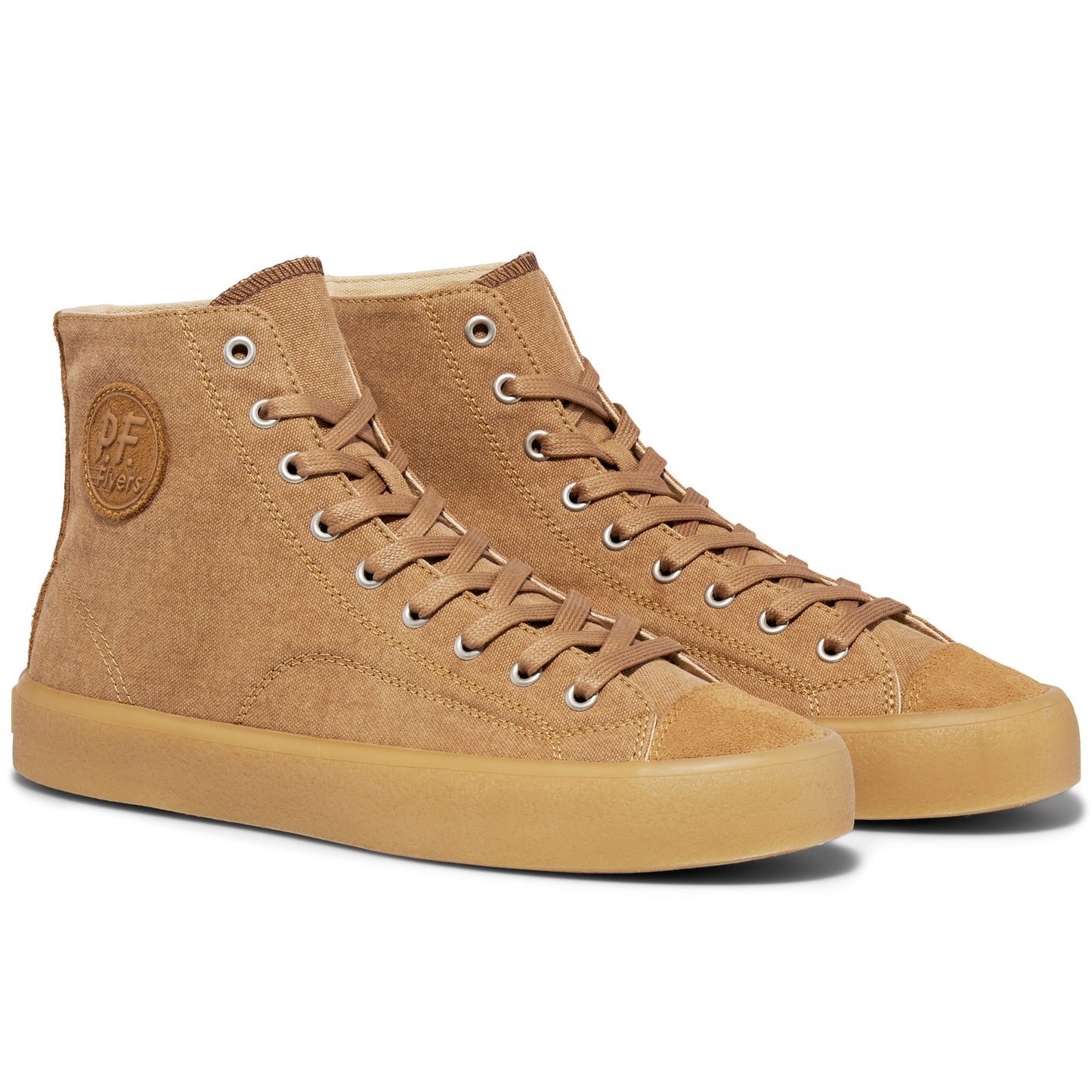 Pair of tan high-top sneakers on a white background.