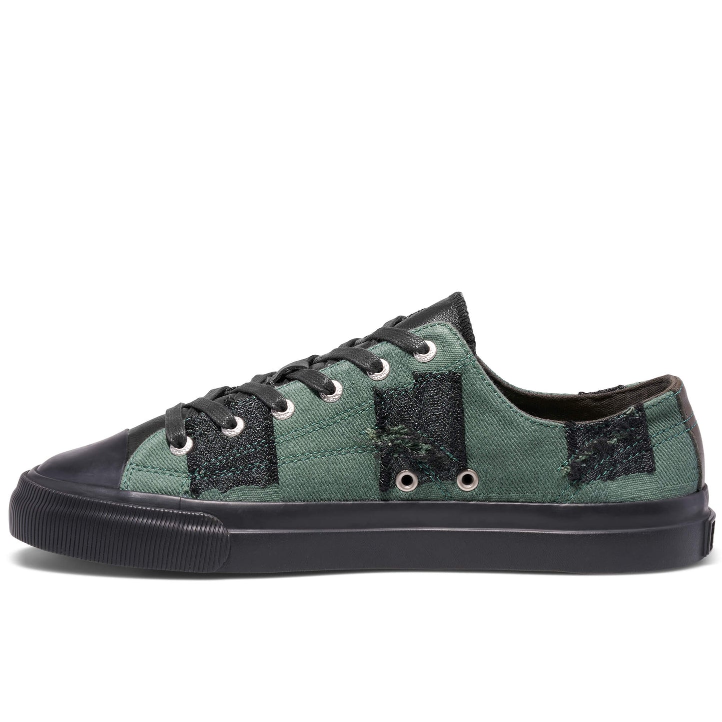 Green and black sneaker on a white background