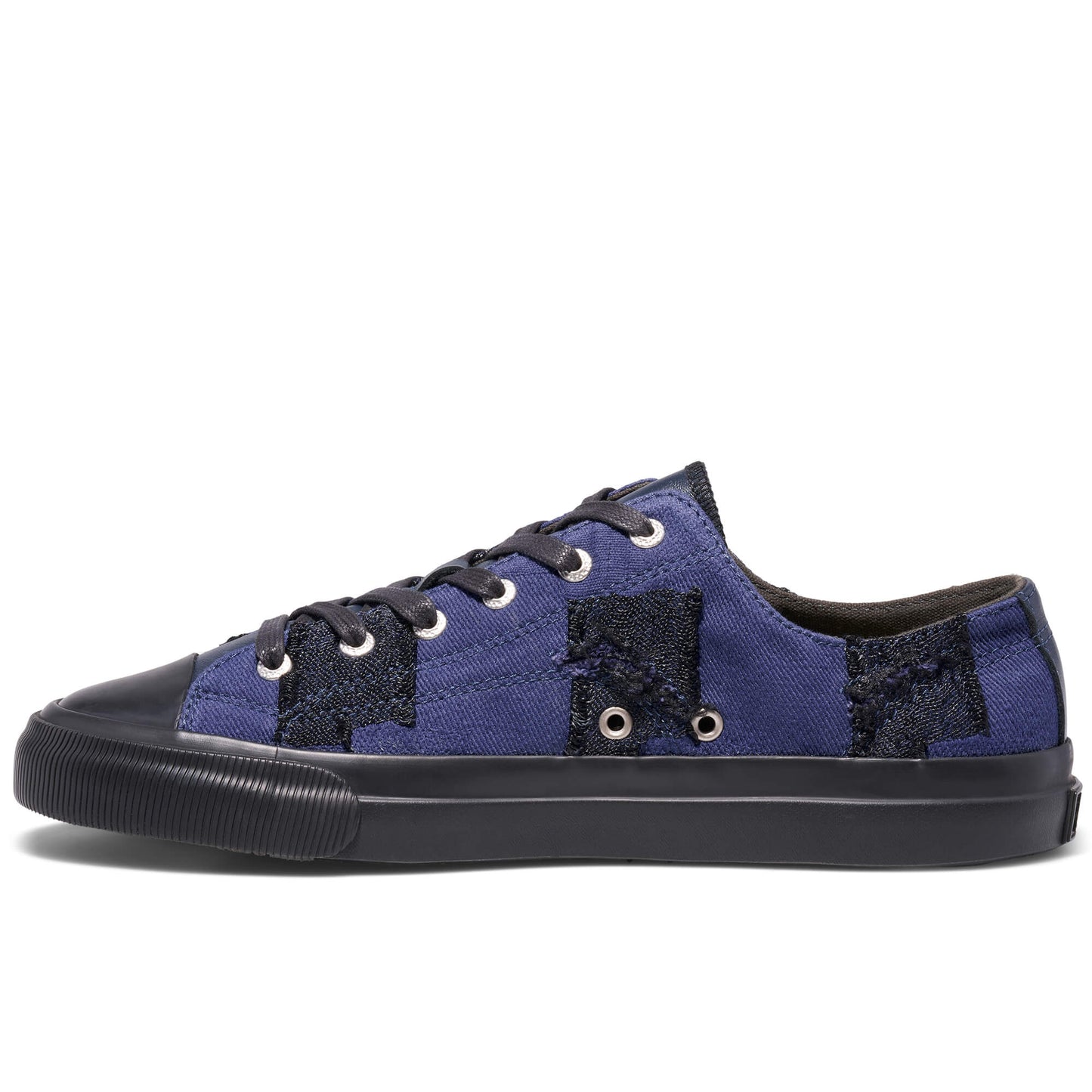 Blue sneaker with black accents on a white background
