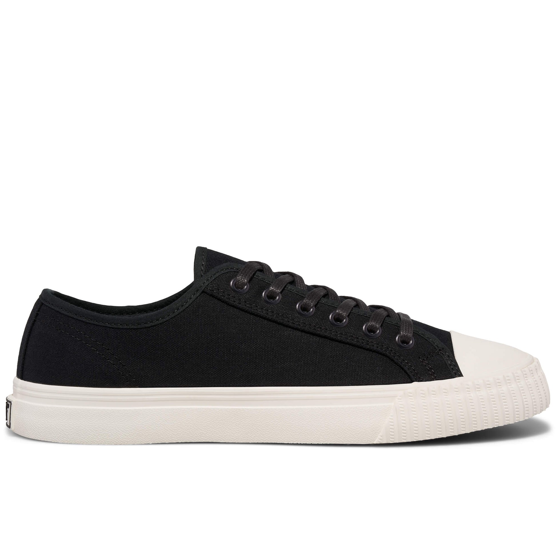Black low-top sneaker with white sole on a white background.