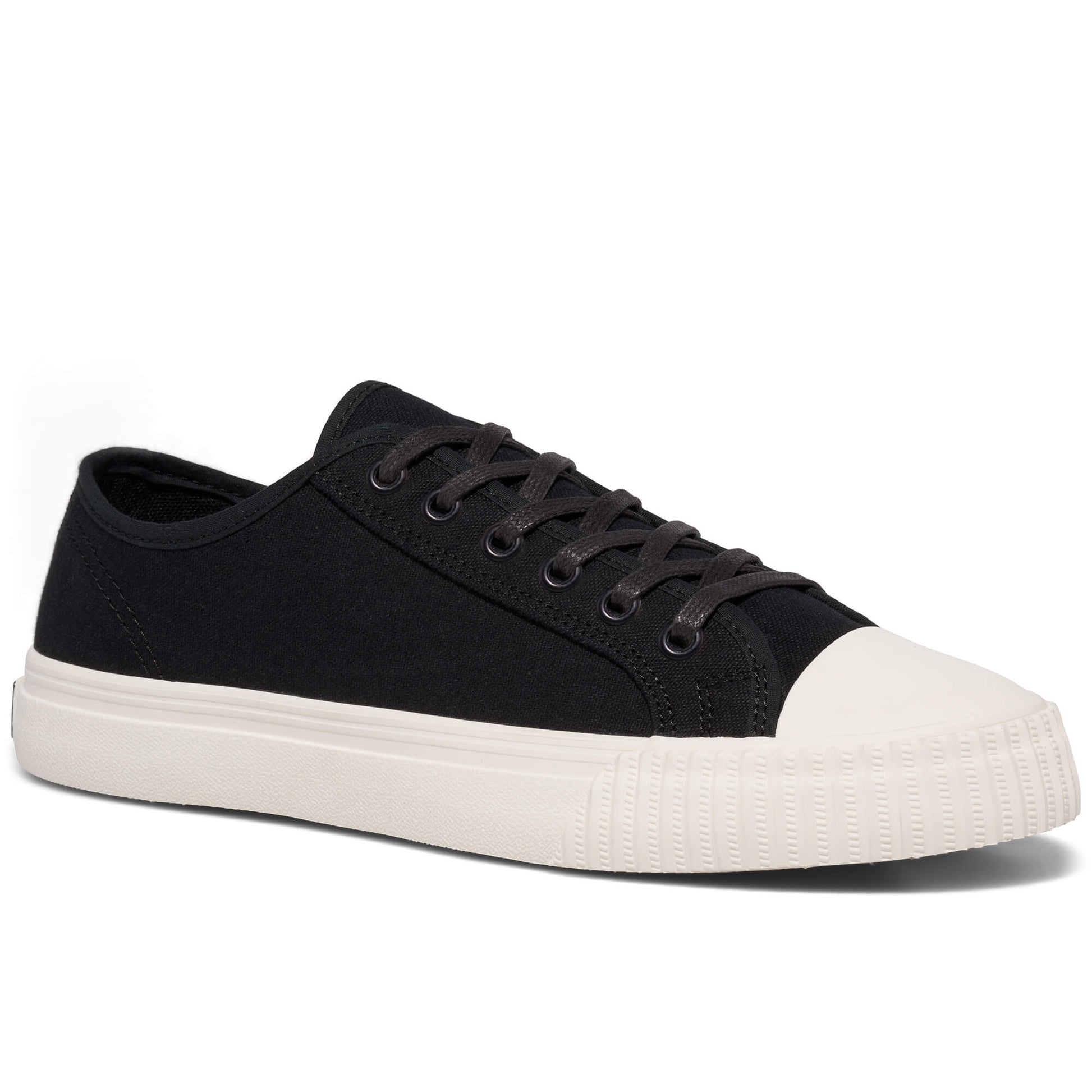 Black low-top sneaker with white sole on a white background.