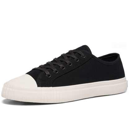 Black low-top sneaker with white sole on a white background.