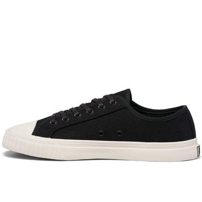 Black low-top sneaker with white sole on a white background.