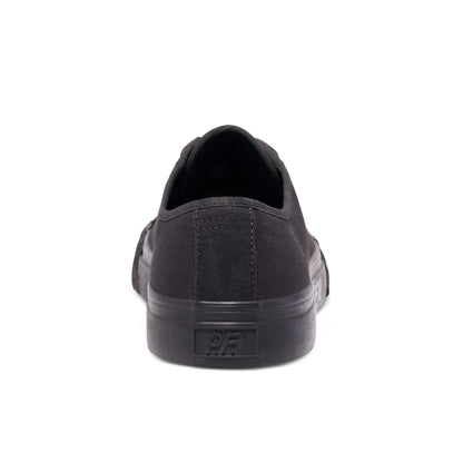 Black sneaker on a white background.