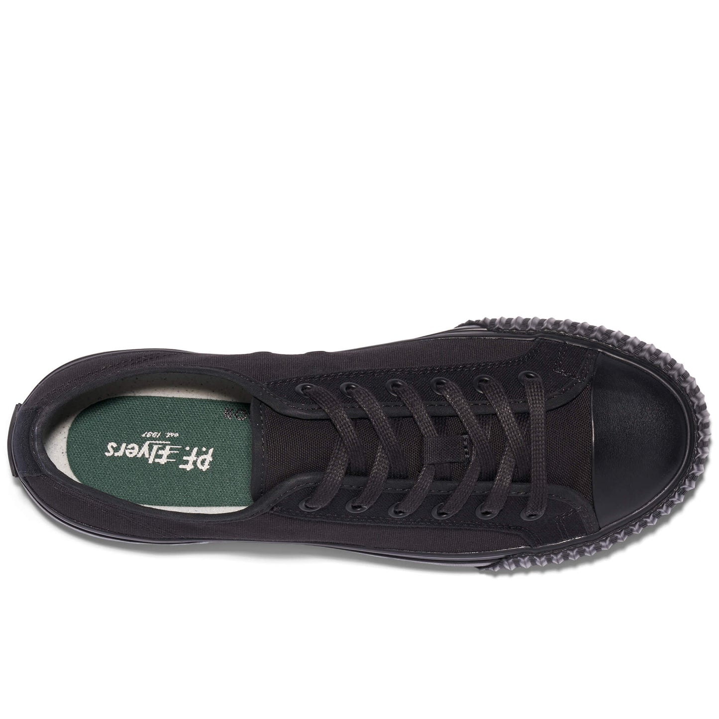 Black low-top sneaker showing the P.F. Flyers logo on the insole against a white background.