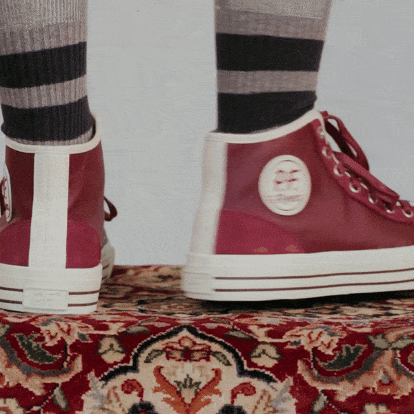 Red high-top leather sneakers