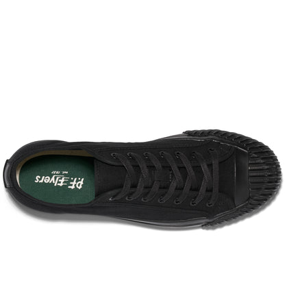 Overhead view of a black low-top sneaker on a white background.