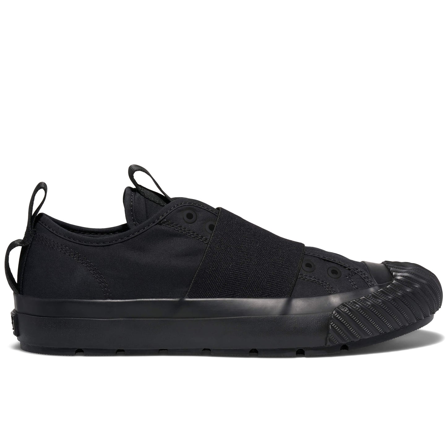 Black slip-on sneaker on a white background