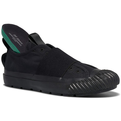 Black slip-on shoe with a white background