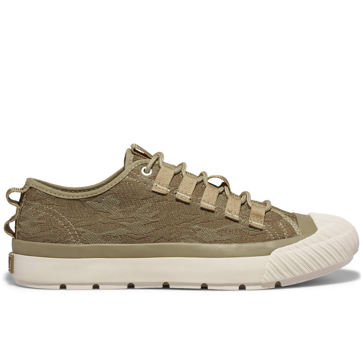 A tan camo-patterned low-top sneaker shown on a white background.