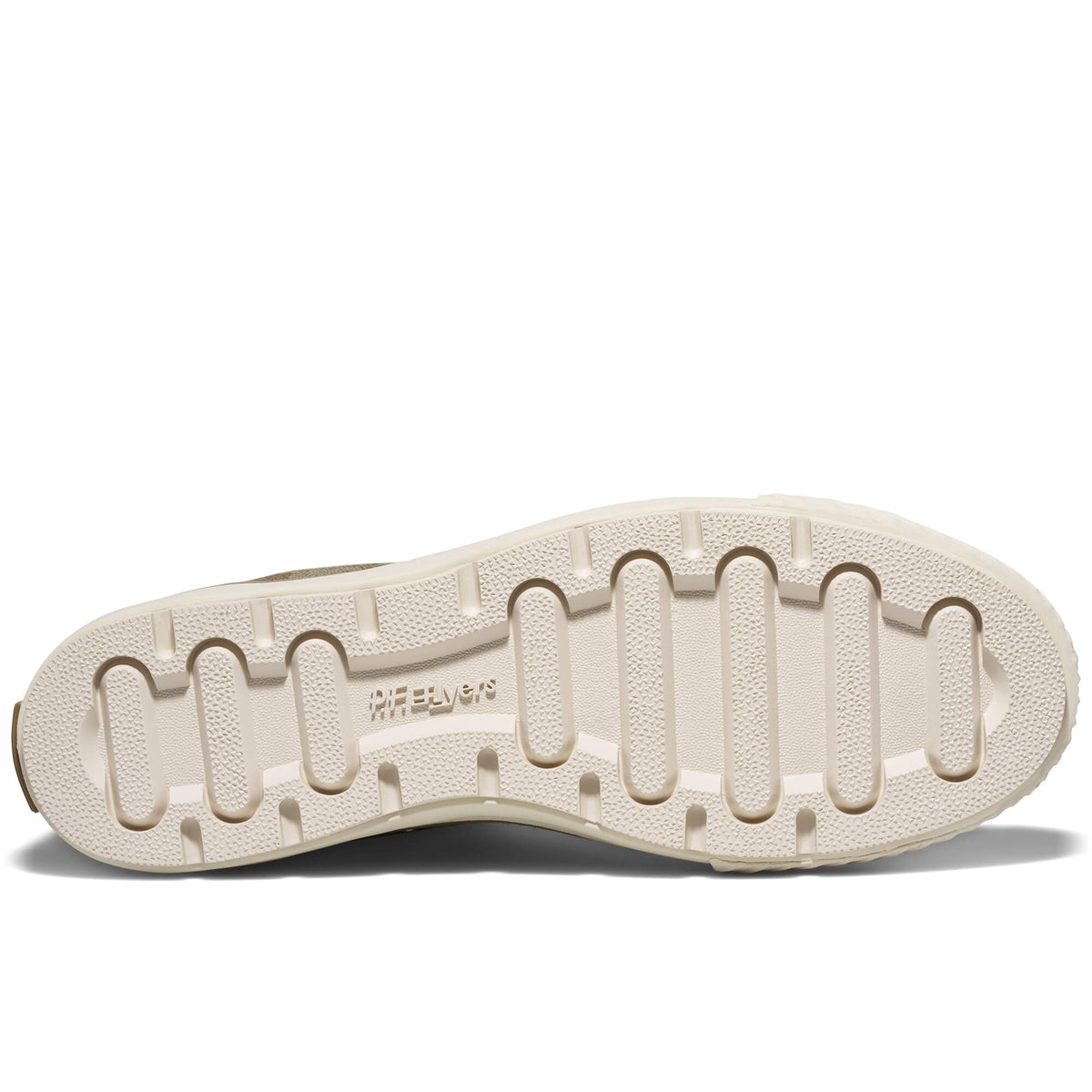 A shoe's off-white rubber outsole set against a plain white background.