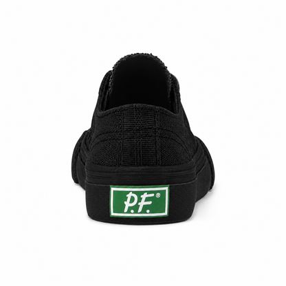 Black low-top sneaker on a white background.